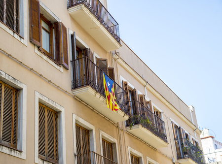 Flag of Catalonia on the balcony of the buildingのeditorial素材