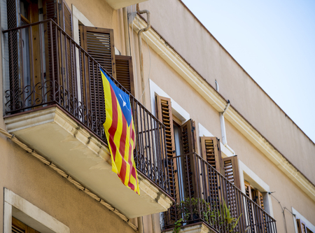 Flag of Catalonia on the balcony of the buildingのeditorial素材