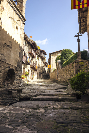 RUPIT I PRUIT, SPAIN - OCTOBER 04, 2016: Volcanic natural stone street in medieval village Rupitのeditorial素材