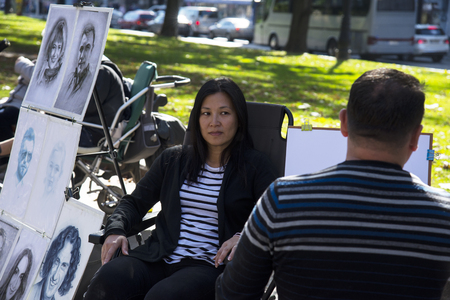 LVIV / UKRAINE - OCTOBER 06, 2018: Painter in the center of Lviv cityのeditorial素材