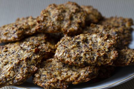 Baked oatmeal cookies with chia seeds and poppyの写真素材