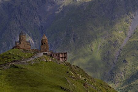 View of Gergeti Trinity Church in the Caucasus mountains. Georgia