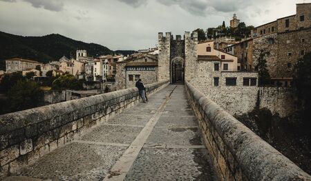 BESALU, GARROTXA / SPAIN - JUNE 28, 2017: Bridge across El Fluvia River in Besaluのeditorial素材