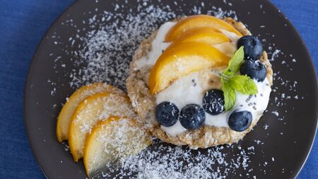 Fresh healthy mini sandwiches with cream cheese and blueberriesの写真素材