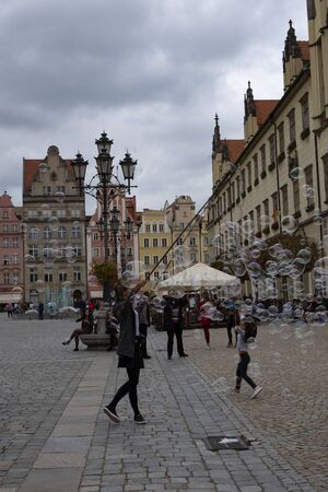 WROCLAW / POLAND - SEPTEMBER 27, 2019: Soap bubbles show at the Market Square in Wroclaw