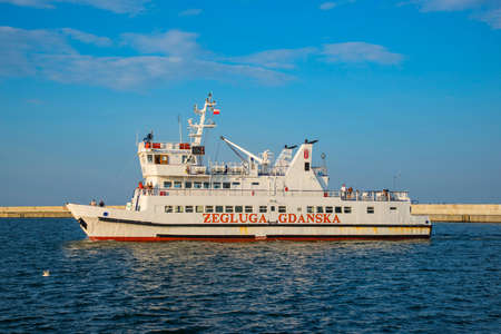 GDYNIA, POMERANIAN VOIVODESHIP / POLAND - JULY 27, 2018: The Zegluga Gdanska cruise ship going on...