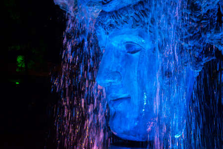 ODESSA / UKRAINE - SEPTEMBER 23, 2018: Sculpture "The Beginning of Time" in the Greek park, a fountain with illumination at nightのeditorial素材