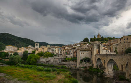 BESALU, GARROTXA / SPAIN - JUNE 28, 2017: Bridge across El Fluvia River in Besaluのeditorial素材