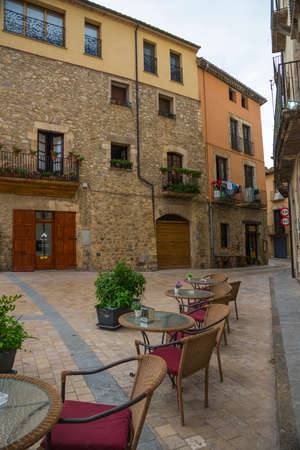 BESALU, GARROTXA / SPAIN - JUNE 28, 2017: Street cafe on the street of the old town of Besaluのeditorial素材