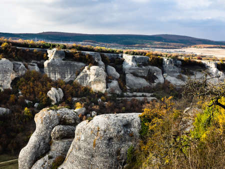 Beautiful views of mountain on a sunny autumn day. The cave city of Eski-Kermen in the Bakhchysarai district, Crimeaの写真素材