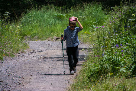 mountain trail. Family trip in mountains. Hike with children. Family travel concept. Active summer holidays.の写真素材