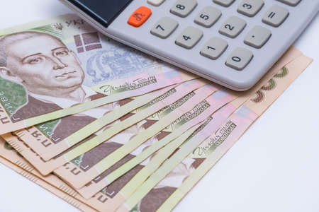 Ukrainian hryvnia, background. Concept of receiving a salary, pension, inflation, deposit and...