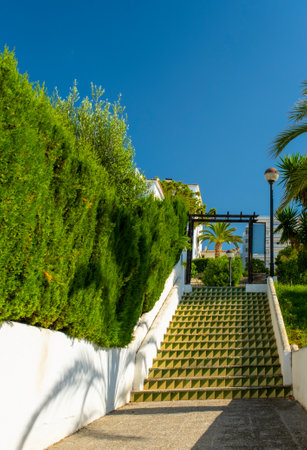 View of the promenade in small resort town Sitges in the suburbs of Barcelona. Catalonia, Spainの写真素材