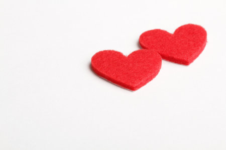 Valentines day background with two hearts on the white backgroundの写真素材