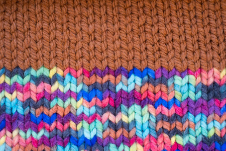 Pattern fabric made of wool. Handmade knitted fabric, color wool background texture. Warm accessories, clothesの写真素材