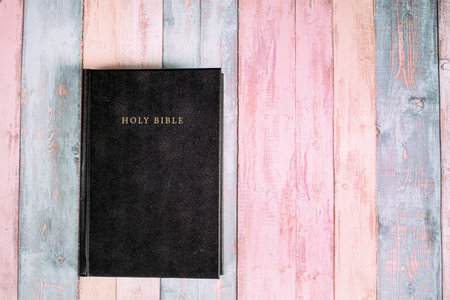 The Holy Bible on the wooden background. Christian background concept with copy spaceの写真素材
