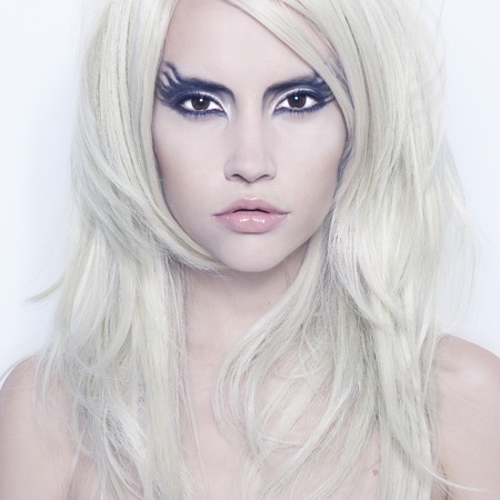 Fashion photography of beautiful young woman with fantasy makeupの写真素材