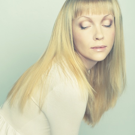 Photo of beautiful woman with magnificent hairの写真素材