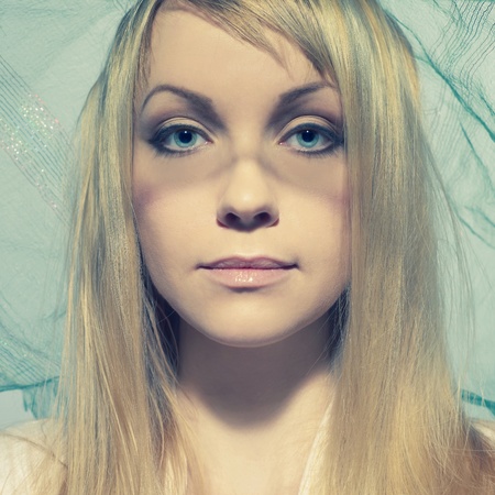 Portrait of beautiful young woman under a veilの写真素材