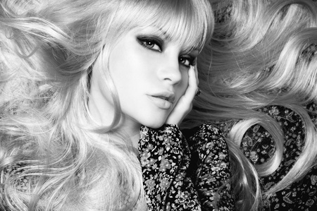 Black and white of  beautiful woman with magnificent hairの写真素材