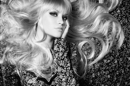 Black and white of  beautiful woman with magnificent hairの写真素材