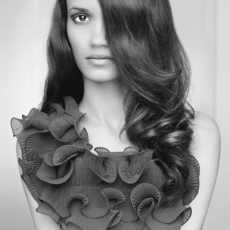 a young beautiful lady with magnificent dark hairの写真素材