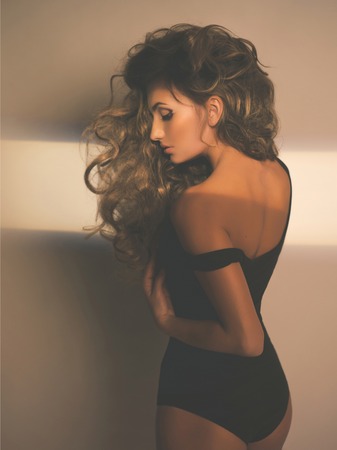 Portrait of beautiful sexy woman with magnificent hairの写真素材