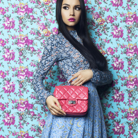 Fashion art photo of beautiful elegant lady on floral background. Spring-Summerの写真素材