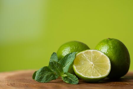 Fresh lime with mint on the table.