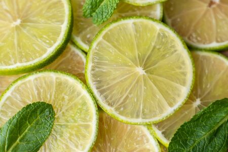 A sliced lime slice on the table. Close up.の写真素材