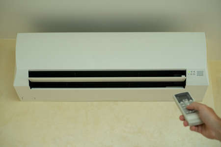 Turn on the air conditioner. Set the temperature on the air conditioner