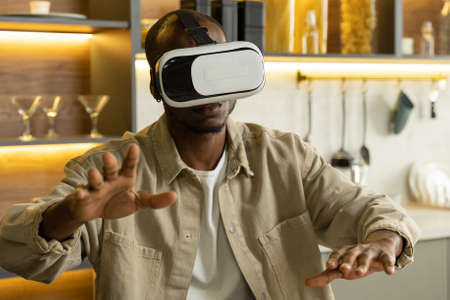 African American man experiences virtual reality technologyの写真素材