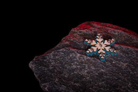 Christmas wooden toys decorations on stone background.の写真素材