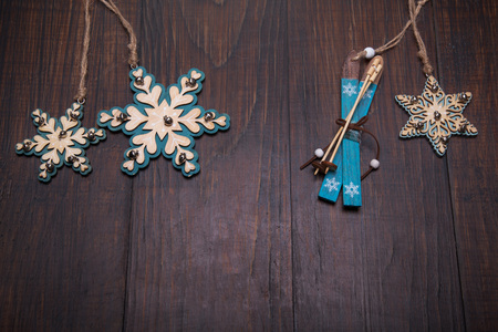 Christmas wooden toys decorations on wood background.の写真素材