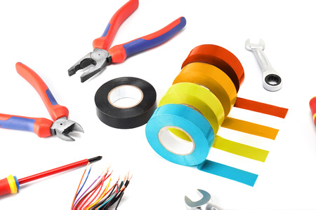 Composition of tools for the electrician repair and its protection and safety on a white isolate...