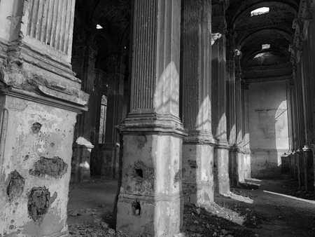 Burnt abandoned interior of an old catholic church in Ukraine, background for mystical kozharovaniya.の写真素材