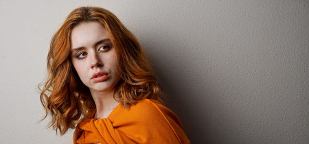 Portrait of a girl Red hair image of a natural lifestyle of modern youth, real emotions, good...