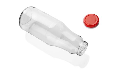 Empty glass bottle for drinks milk, juice, water on a white