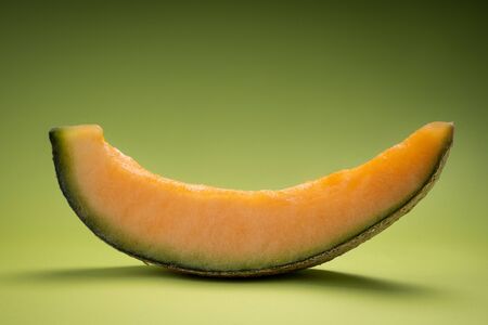 Cut Natural Melon, a healthy product full of vitamins. For advertising vegan food and lifestyle.