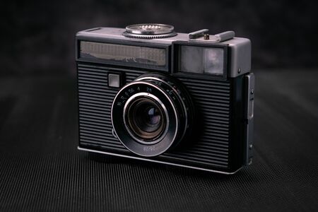 Old vintage film 36mm photo camera, lifestyle memory. Take pictures with a manual lens history.の写真素材