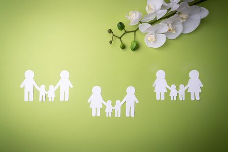 Family symbol cut out of white paper.の写真素材