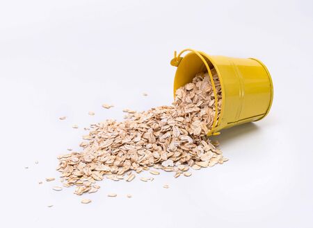 Natural oatmeal flakes, healthy food ingredients with vitamins.