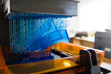 3D printing process. Modern 3D print technology. Working 3d printer machine printing a detail. Close-up.の写真素材