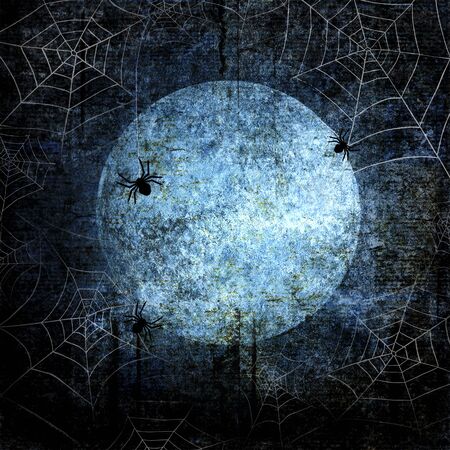 Halloween blue navy gray grunge background with full moon, silhouettes of webs and spiders on dark spooky night sky. Halloween, horror concept. Space for text.の写真素材
