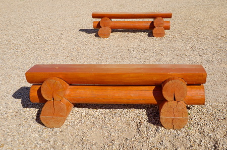 Wooden benches made of logs