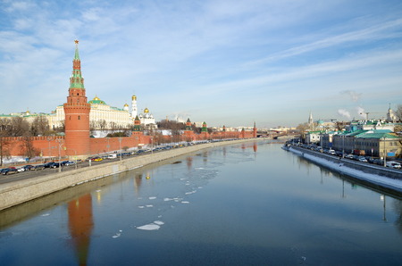 Beautiful views of Moscow Kremlin, Kremlevskaya and Sophiyskaya embankments in Sunny winter day, Moscow, Russiaの写真素材