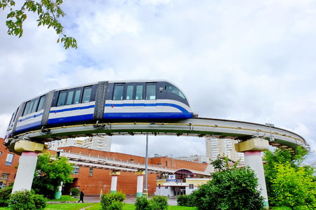 Moscow, Russia - July 5, 2017: Moscow's elevated monorail with the train turning at the...