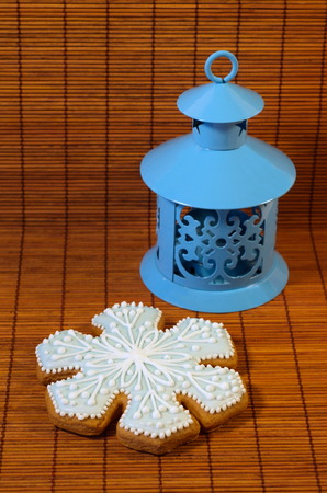 Christmas composition - magic flashlight and gingerbreadの写真素材