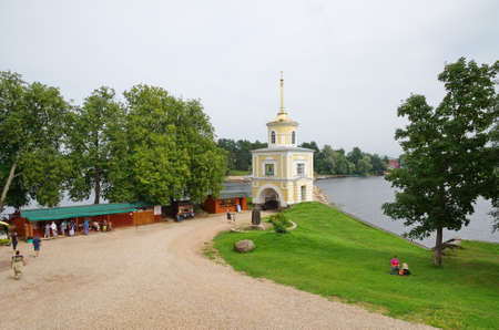 Tver Region, Russia - July 27, 2018: Nilo-Stolobenskaya Pustyn (deserts) Monastery. Summer view of the Svetlitskaya Tower and the monument to St. Nilのeditorial素材