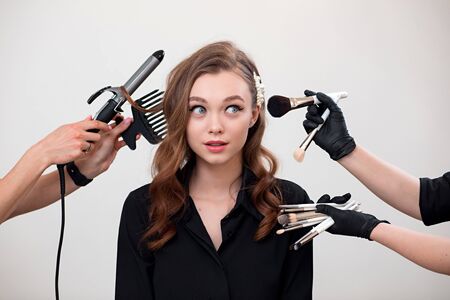 Beautiful young woman with make-up in a black shirt. Sparklesの写真素材